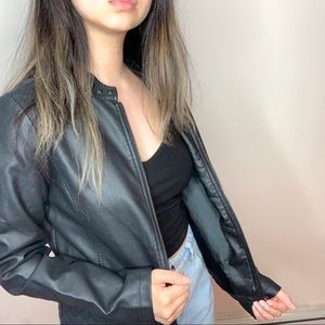 black faux leather jacket with studs and quilting